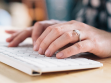 woman typing on keyboard