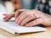 woman typing on keyboard